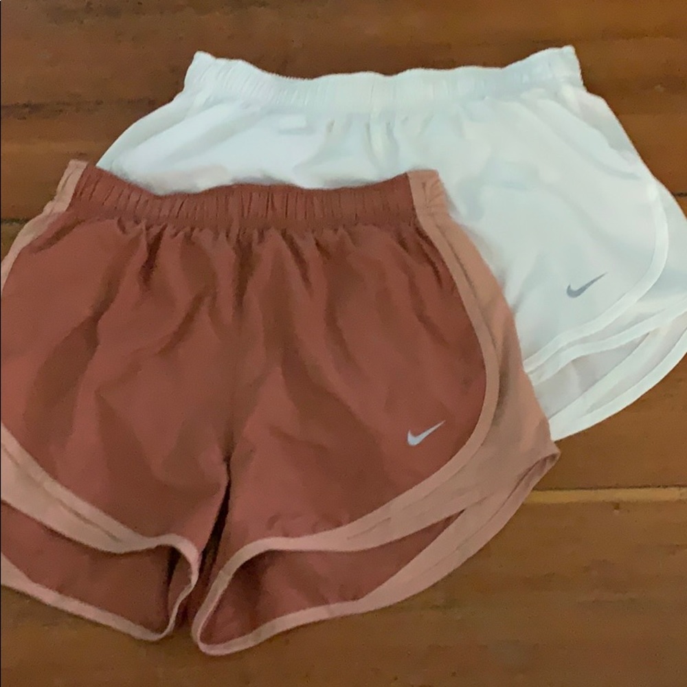 orange ones are a small and the white is a medium